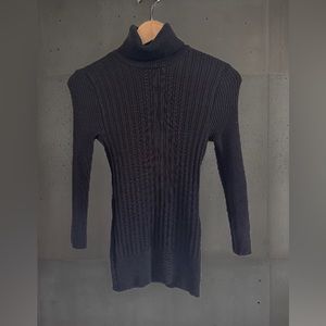 Bebe women’s black stretch turtle neck Size S. Used but in great condition